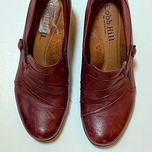 Super comfortable wine colored shoes.